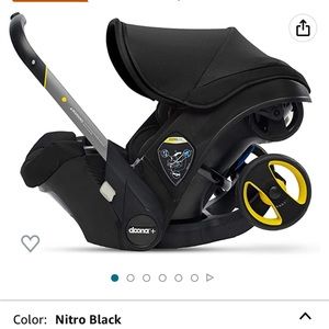 Doona car seat, base, all day pack, and diaper bag